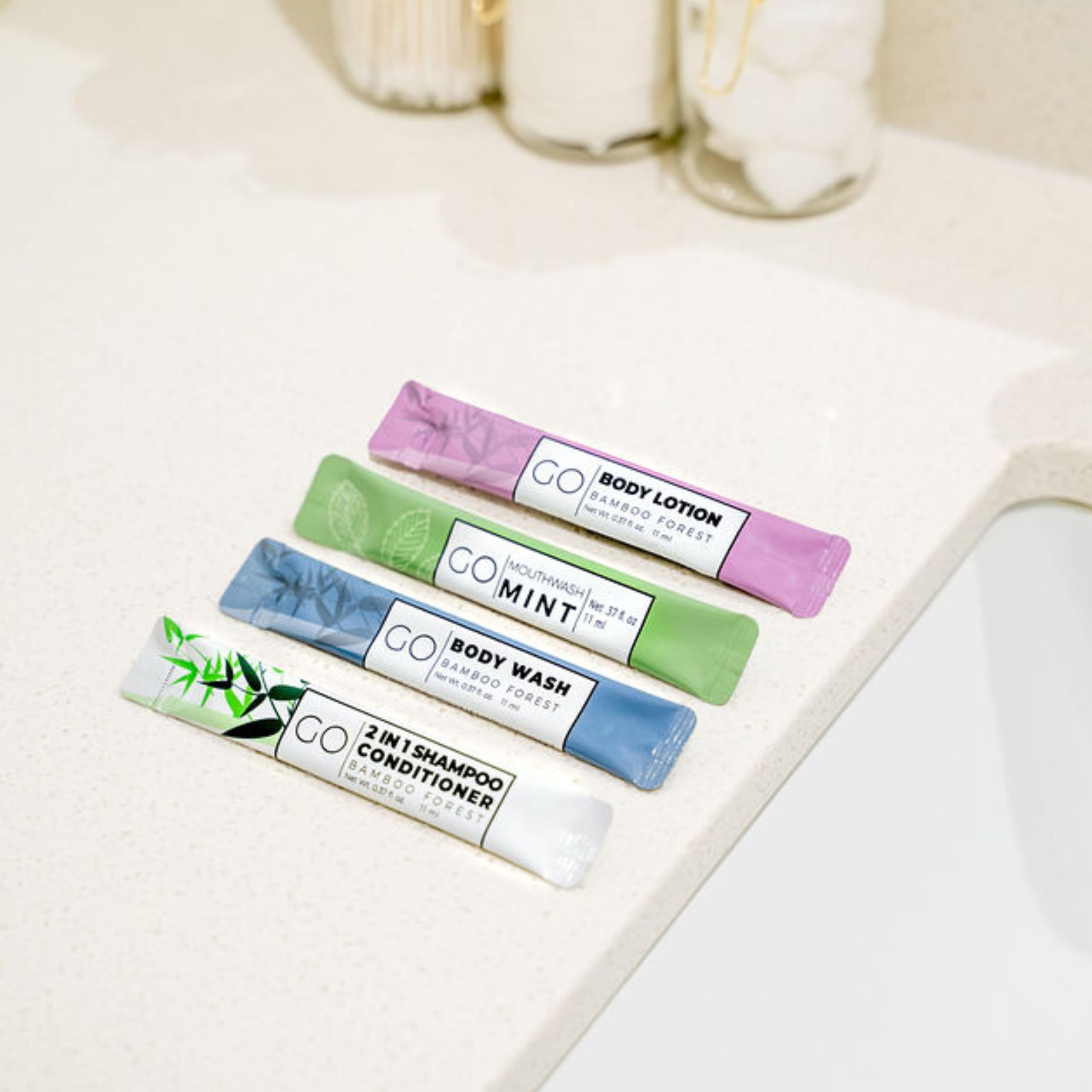 GO Essentials - Men and Women Travel Kit that contains Travel Size Shampoo and Conditioner Set, Mouthwash, Body Wash, and Travel