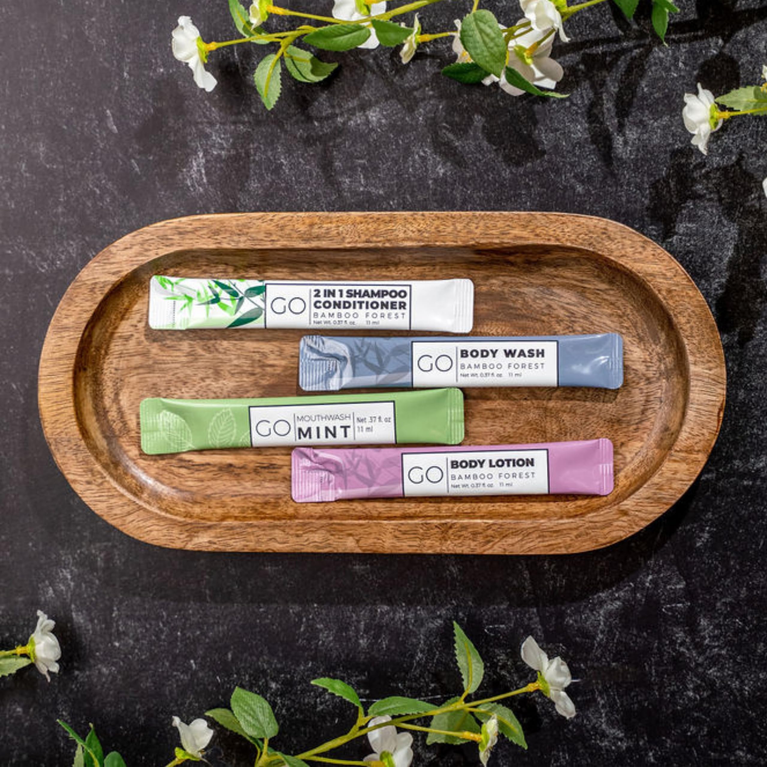 GO Essentials - Men and Women Travel Kit that contains Travel Size Shampoo and Conditioner Set, Mouthwash, Body Wash, and Travel